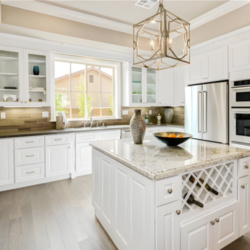 Airy kitchen layout featuring Snow Bay cabinetry, open wooden shelving, marble backsplash, and a large granite-top island.