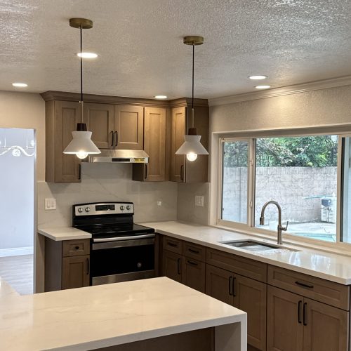 Modern kitchen featuring Willowdale CYW light-brown shaker cabinets